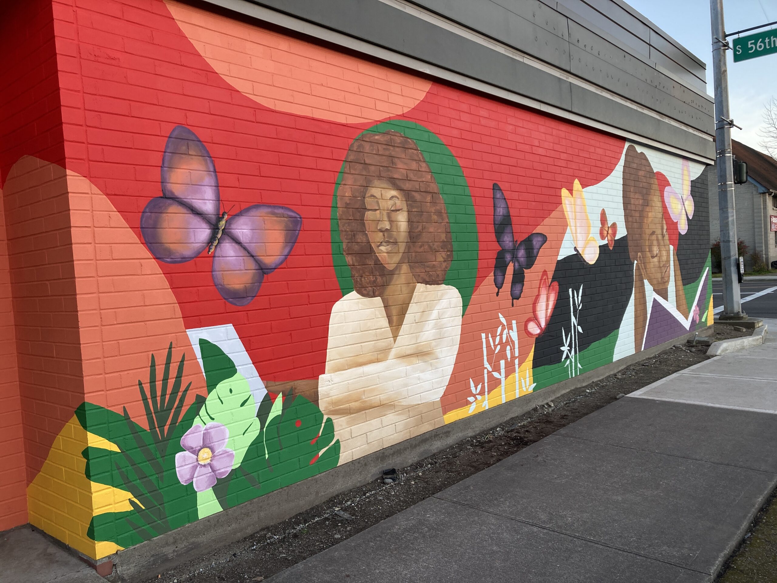 mural artist Dionne Bonner painting Black Lives Matter Mural